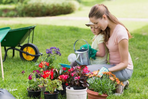 Gardening team reviewing client instructions and access notes